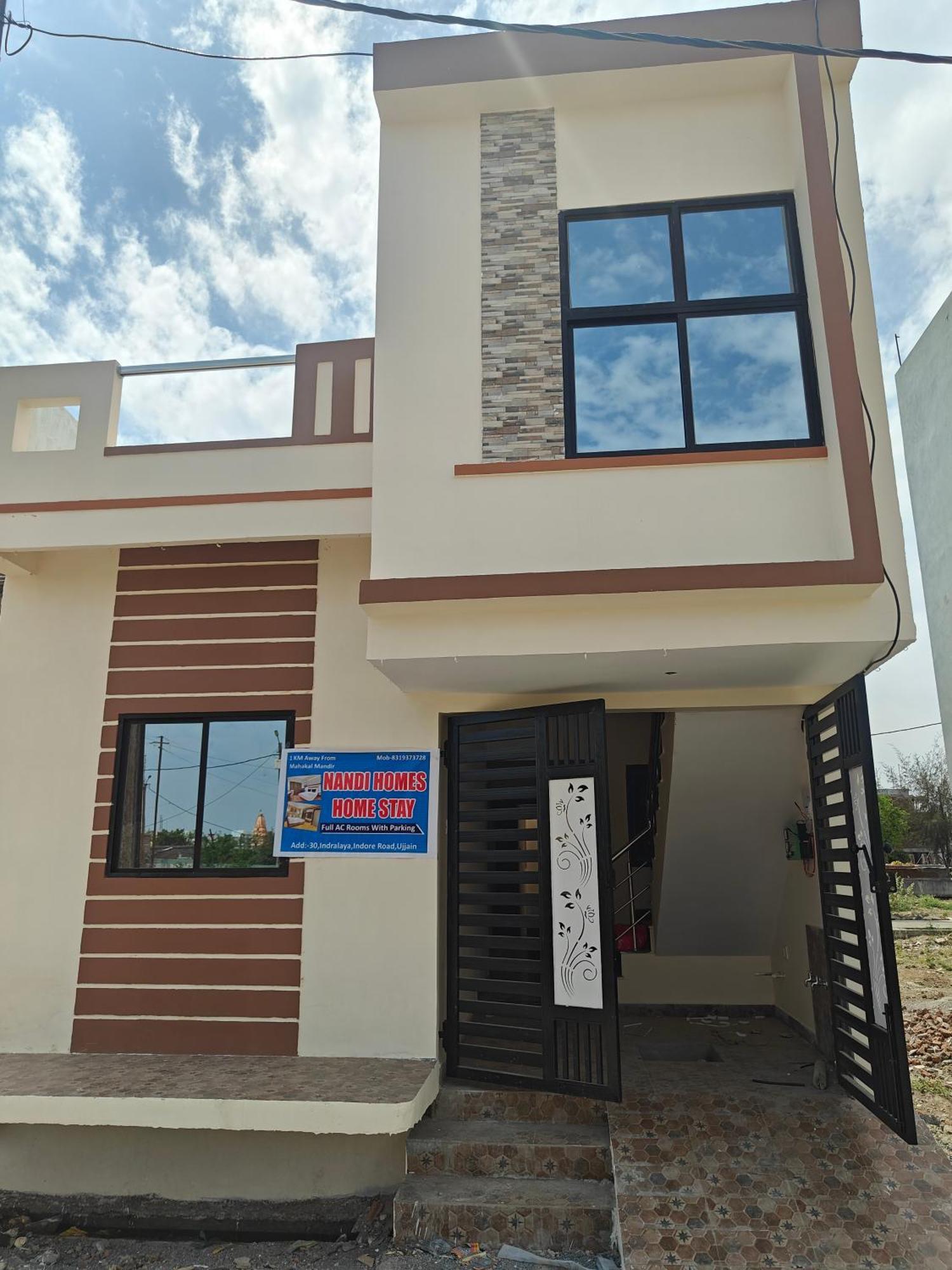 Nandi Homes Homestay 乌贾因 外观 照片
